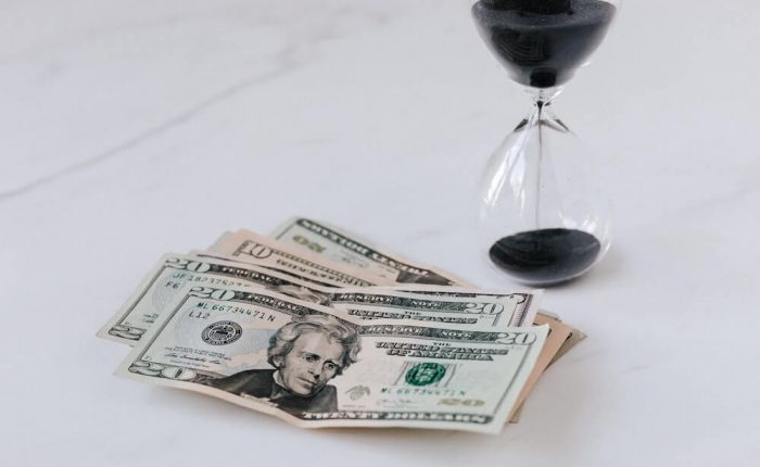 money debt hour glass running out of time